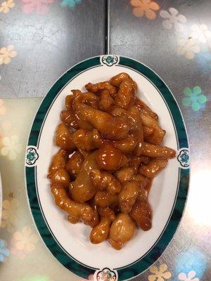 It is new honey chicken . fried white meat chicken with honey sauce .