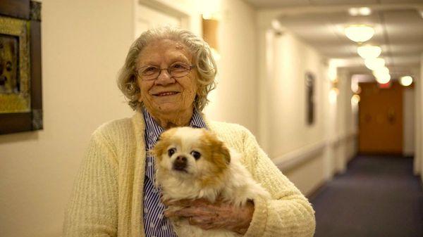 Resident With Her Pet at Kingston Residence of Santa Fe