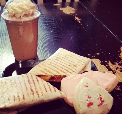 Mocha frappe, breakfast wrap, and sugar cookies. The perfect addition to our road trip.