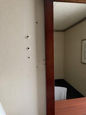 Holes in wall