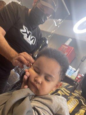 My Little mans knocked out while getting his cut.