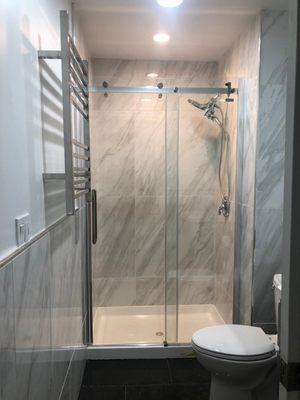 Newly renovated bathrooms with heated towel racks