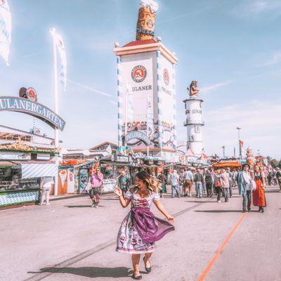 Travel Blogger Christina Guan from happytowander.com in a custom dirndl at Oktoberfest