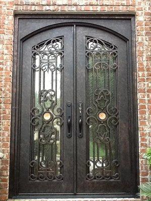 iron door with scroll pattern