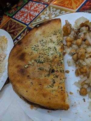 Garlic naan and what was left of the samosa and chickpeas