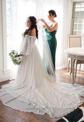 My wedding dress and maid of honors dress both altered by Chiara