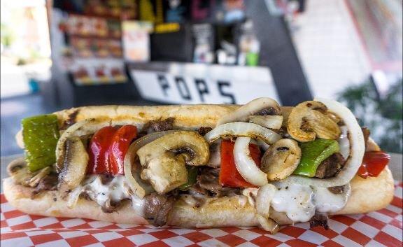 #32 Philly Cheesesteak with peppers, onions, mushrooms & cheese. One of our most popular!