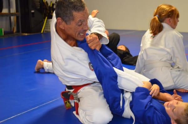 Master Relson Gracie training with Master Schill's youngest son