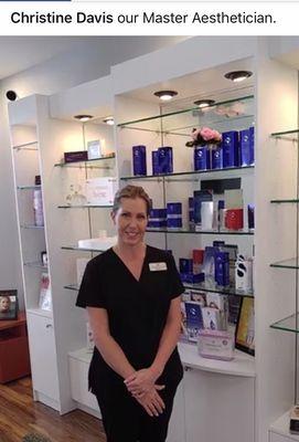 Master Esthestician, Christine teaching us about products.