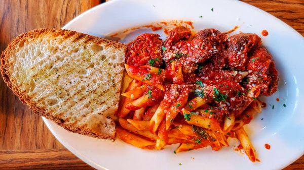 Braciole dinner ( rolled flank steak in tomato sauce and pasta )