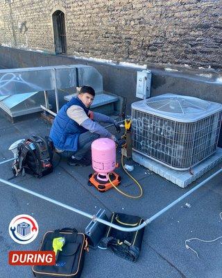 HVAC diagnostic. Refrigerant R-410 refilling.