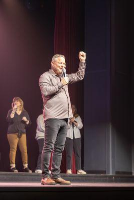 Pastor Mark Morrow encouraging the congregation while preaching.