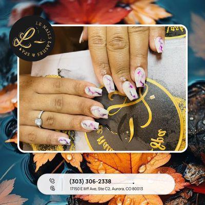 Get ready to electrify your Halloween look with this stunning lightning nail design! Let your nails shine bright this spooky season!