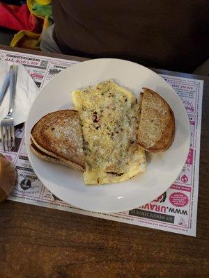 Meat lovers omelet, 3  eggs and rye toast.