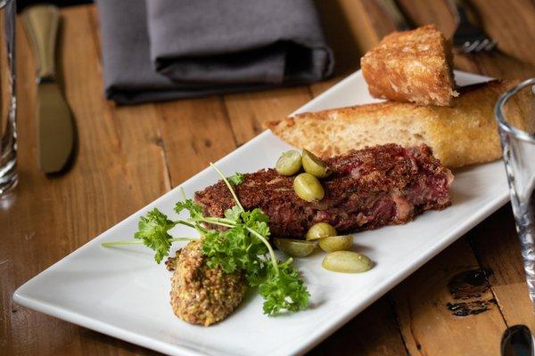 Crispy Buckner Lamb terrine with pickled cucamelon and whole grain mustard