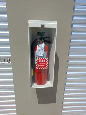 Fire extinguishers ready available on each row.