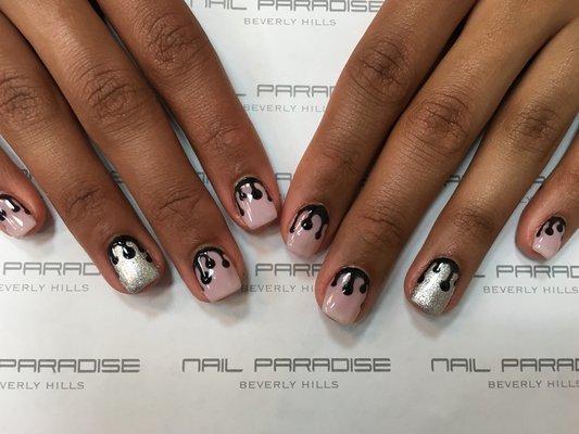 Acrylic nails with gel overlays. Drip paint design.