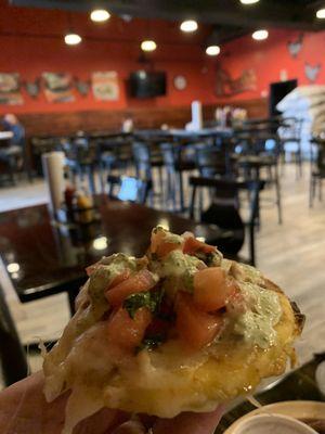 Tostones con Pollo y Queso, poco, and Green Sauce