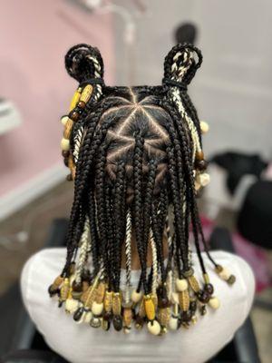 Get some knotless braids in Portland and look golden