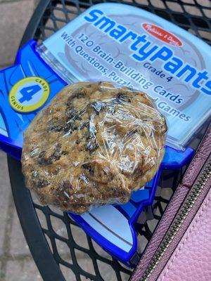 Vegan oatmeal raisin cookie with maple icing filling