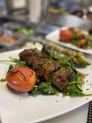 Filet Mignon Kebab over Mediterranean spinach