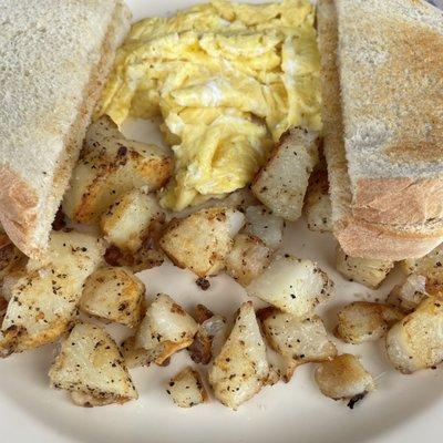 Two eggs and toast breakfast plate