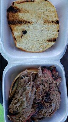 Grilled bun and tender, juicy smoked beef brisket.