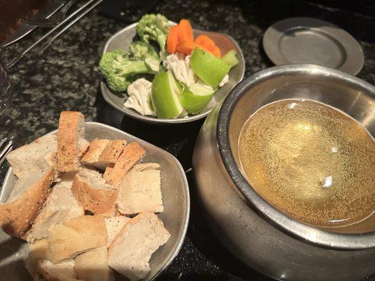 Our Cheese Fondue appetizer. Heating the beer base before melting Monterey Jack cheese and garlic