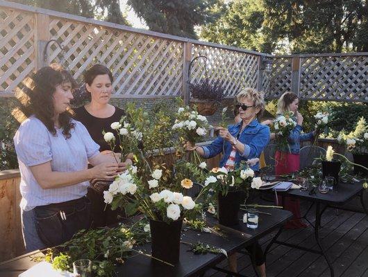 Working on our sunny deck in the summer. In the winter it's inside by the fire!