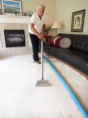 The wand steam cleans using low moisture, hot water extraction, emulsifies and rinses soiled carpets for deep cleaning.