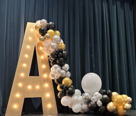 6ft tall lighted letters and Basic Organic half arch (10ft long)