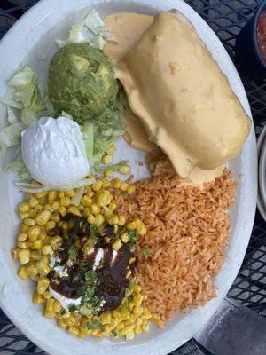 Chimichanga with brisket and queso, side of rice and street corn