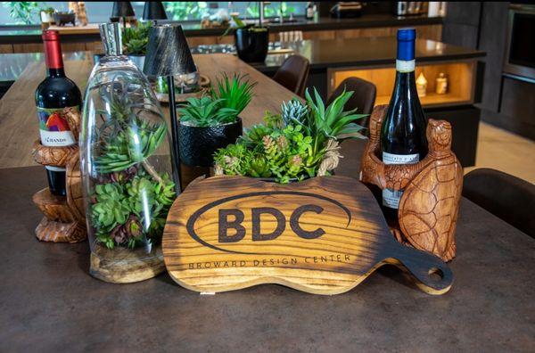 Our BDC cutting board along with our double turtle wine holder!