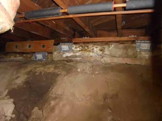 water intrusion damage from exterior into basement/crawlspace