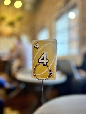 An UNO card used to display our order. Your drinks are brought to your table.