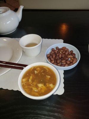 Starter soup, boiled peanuts and hot tea