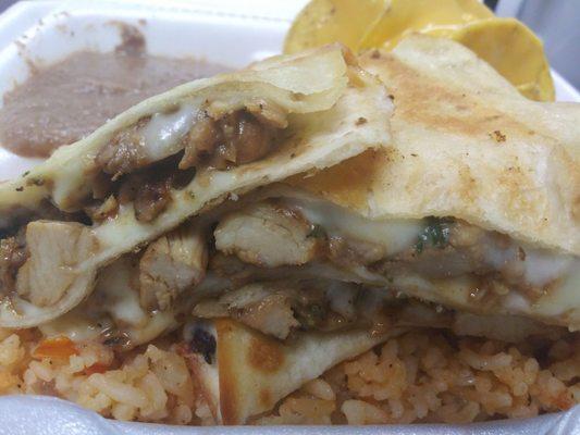 Chicken Quesadilla FILLED, rice, beans, chips & cheese. Tender & awesome marinated chicken