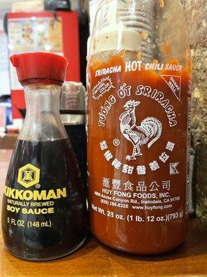 Noodle condiments on each table