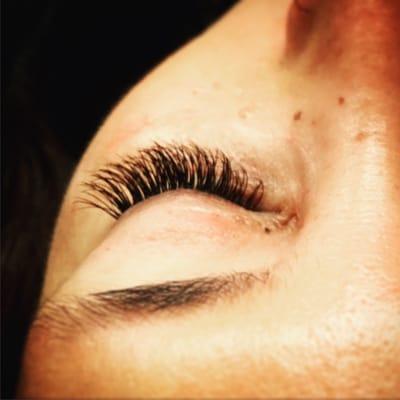 Lash repair client after 3 visits. Originally came in with broken and missing lashes from a bad experience elsewhere.