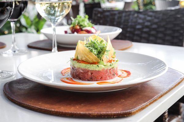 Tuna Tartar with avocado, olivata, plantain chips, mediterranean salsa