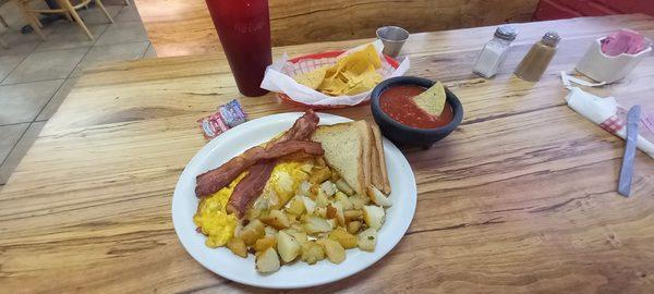 Breakfast at Miguel'. Spanish Omelet plate with bacon.  Excellent.