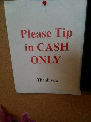 Important for your hard working massage therapist. Please tip in cash!