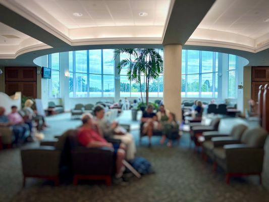 Second story waiting room -- visitors blurred out for privacy.