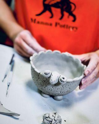 Pottery making studio.  A bowl with a ship character.  Mannapottery is all about having fun.