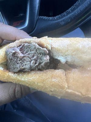 Overcooked steak sandwich