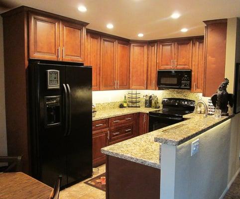 A+ for cabinets, granite counters and lights