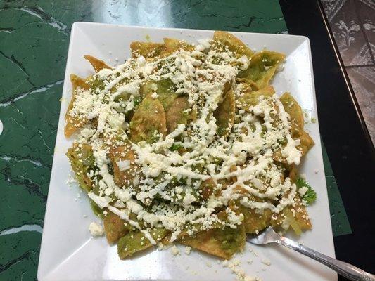 chilaquiles chips w/ green or red sauce, cream w/ cheese