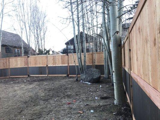 Custom wood and corrugated metal fence