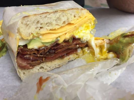 Bacon Egg and Cheese with Avocado on an English Muffin