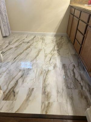 Calacatta MARMI Gold 12x24 porcelain tile.